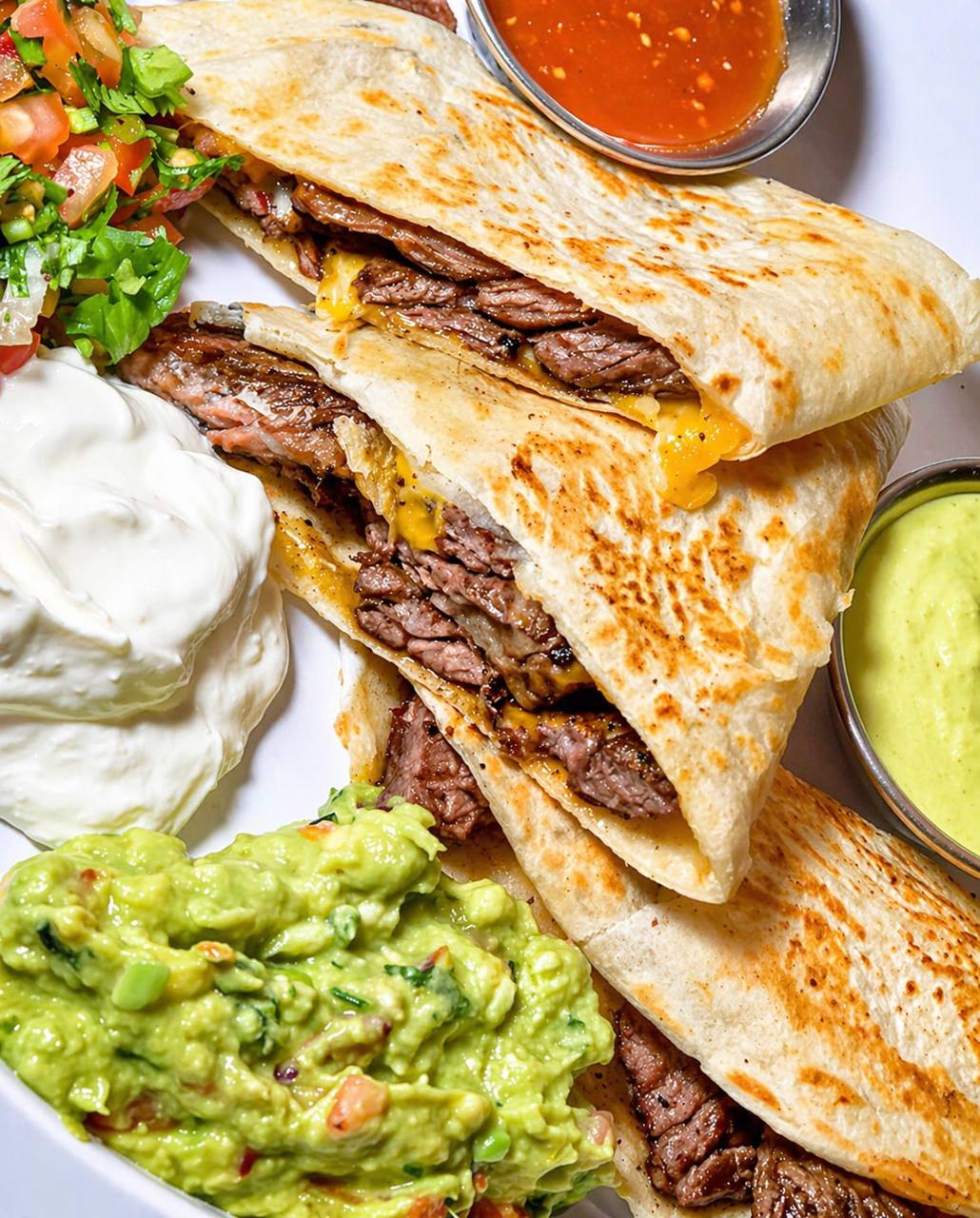Steak quesadilla with guacamole, sour cream and pico at Jalisco Food Truck Bastrop TX